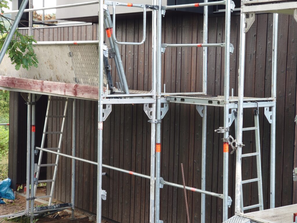 Scaffolded Yakisugi façade ready for maintenance coating